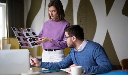 Designers reviewing social media creatives